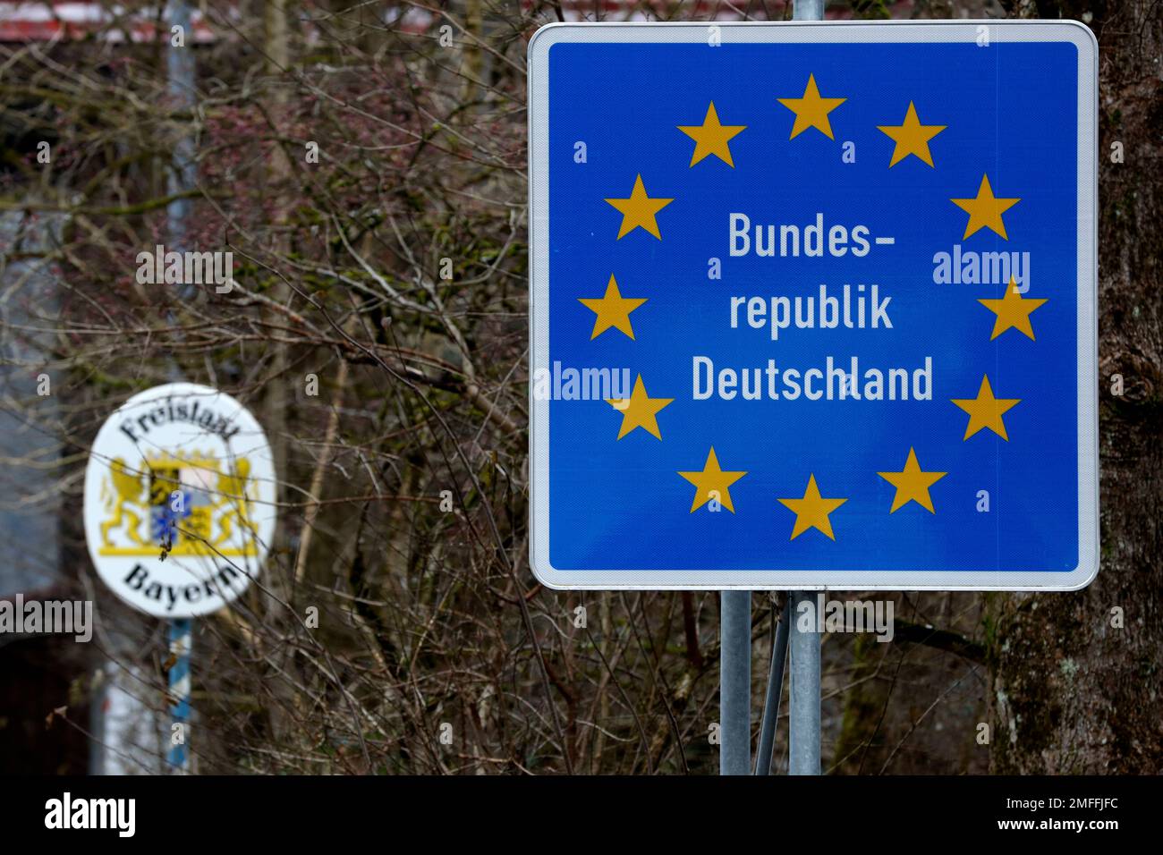 A German border sign stands at the Austrian-German border in Sachrang, Germany, Thursday, Dec. 10, 2020. (AP Photo/Matthias Schrader) Stock Photo