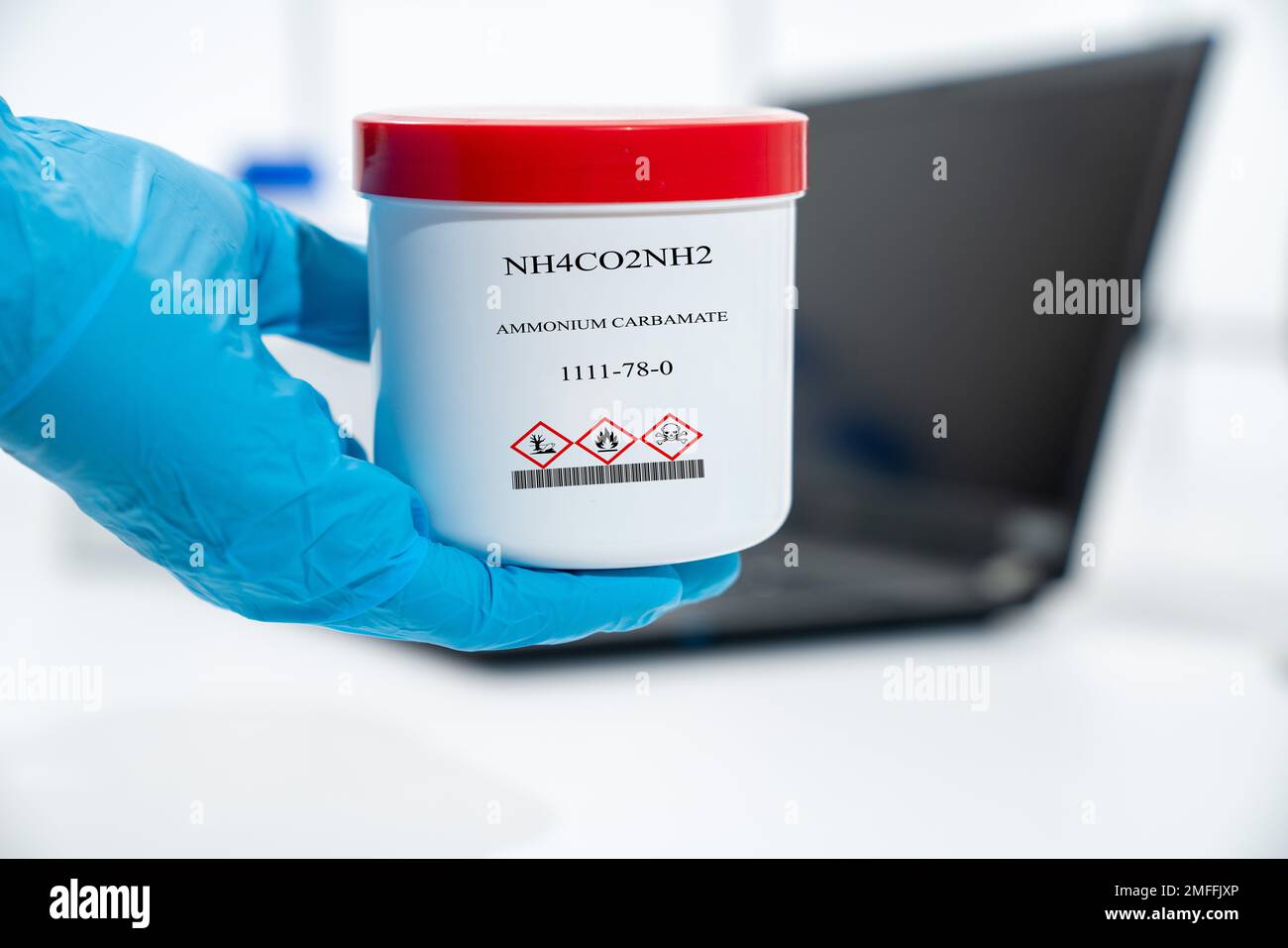 NH4CO2NH2 ammonium carbamate CAS 1111-78-0 chemical substance in white plastic laboratory packaging Stock Photo