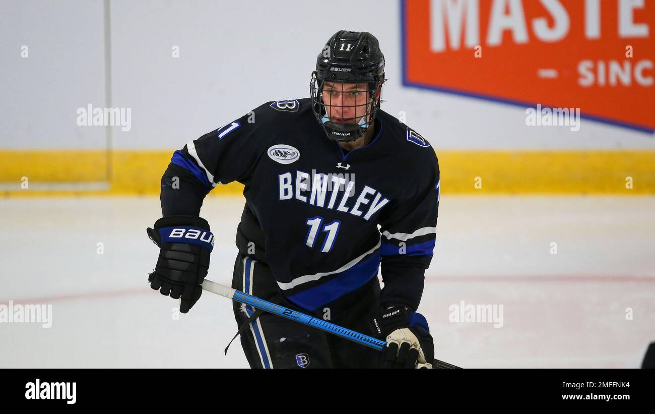 Bentley's Jakov Novak (11) during an NCAA hockey game against Holy