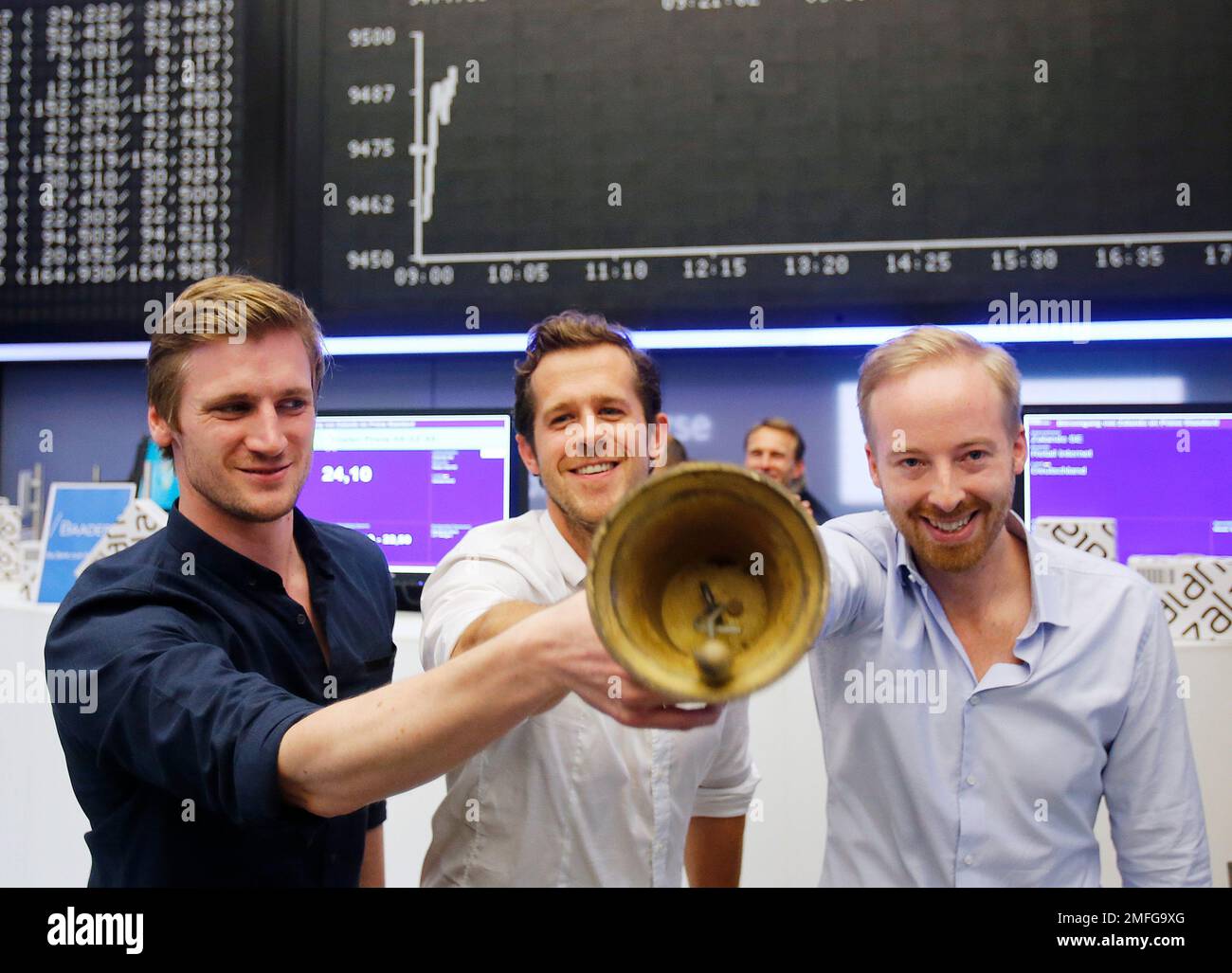 FILE - In this Jan. 10, 2014 file photo, the three CEOs of German online  warehouse Zalando, David Schneider, Robert Gentz and Rubin Ritter, from  left, ring the bell during the company's
