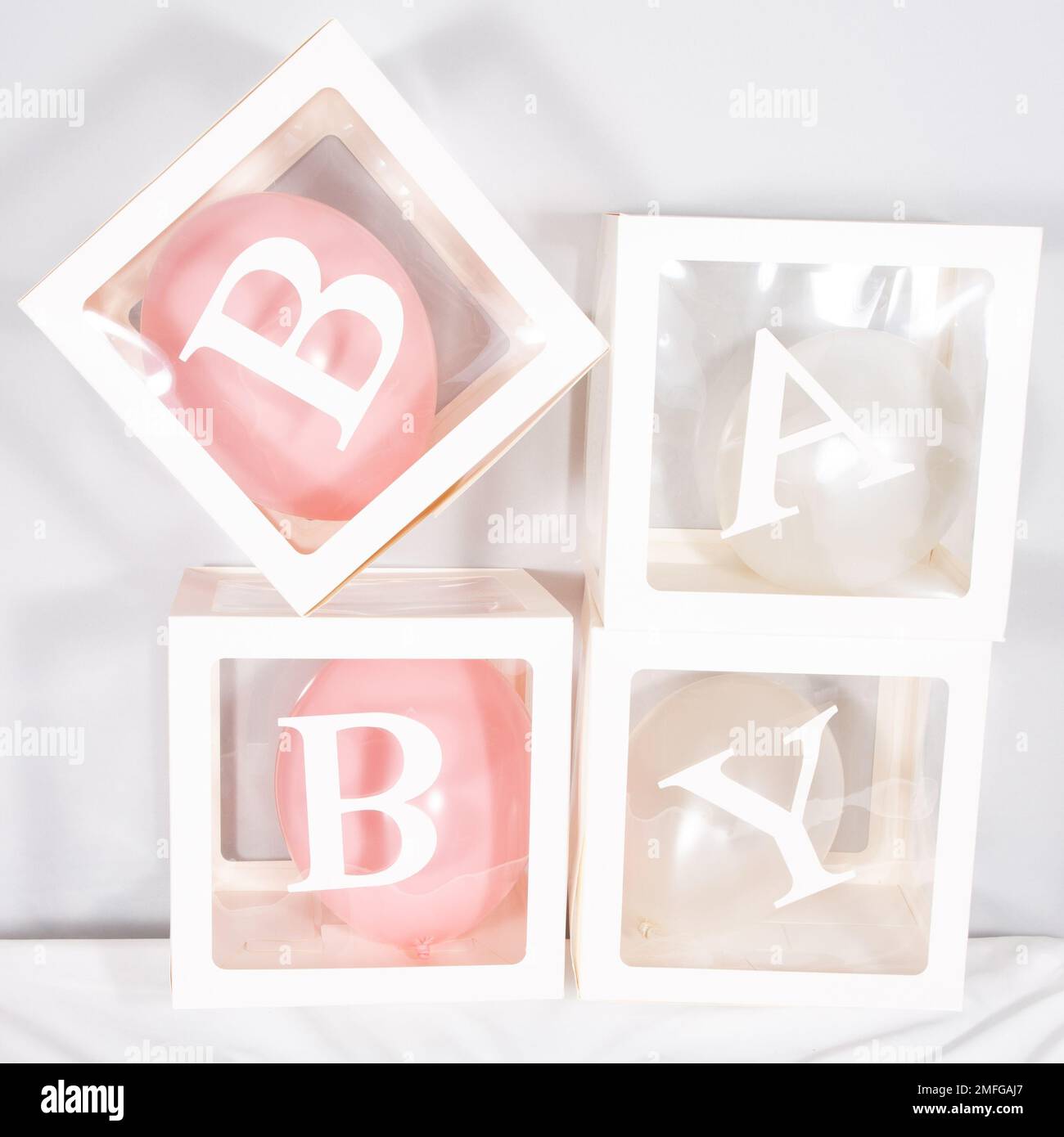 Baby Lettering Stack Stacked Baby alphabet plastic decoration blocks Stock Photo - Alamy