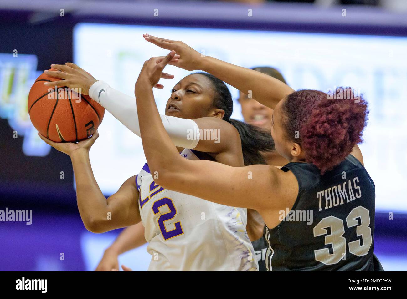 LSU guard Tiara Young (2) passes agains UCF forward Destiny Thomas (33) during an NCAA