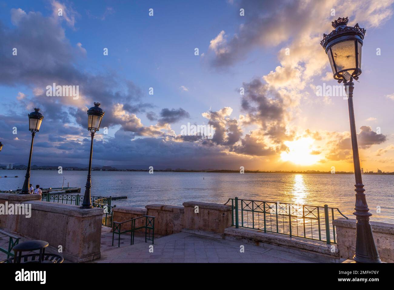 A view of a beautiful beach in San Juan city in Puerto Rico at sunset ...