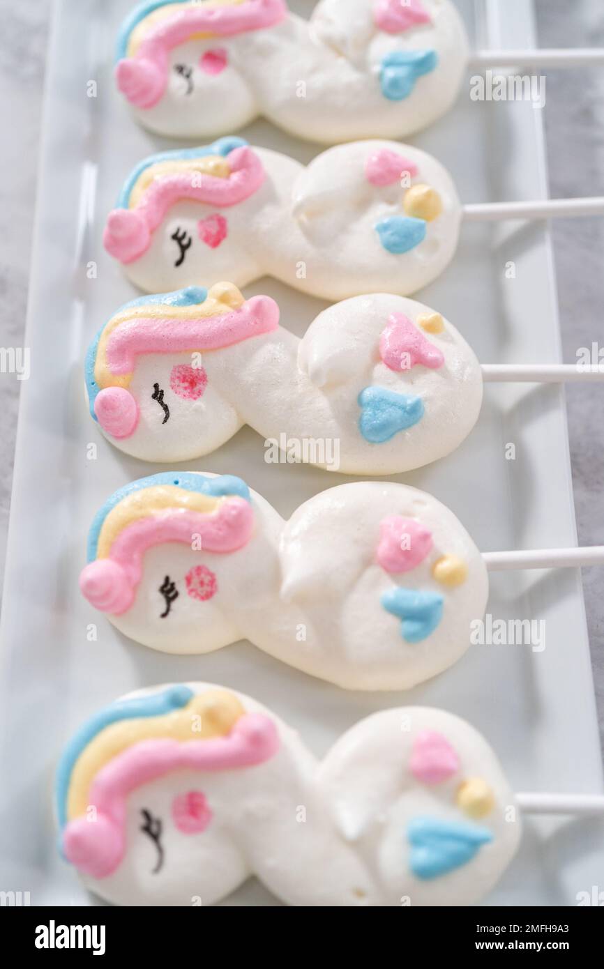 Unicorn meringue pops Stock Photo Alamy