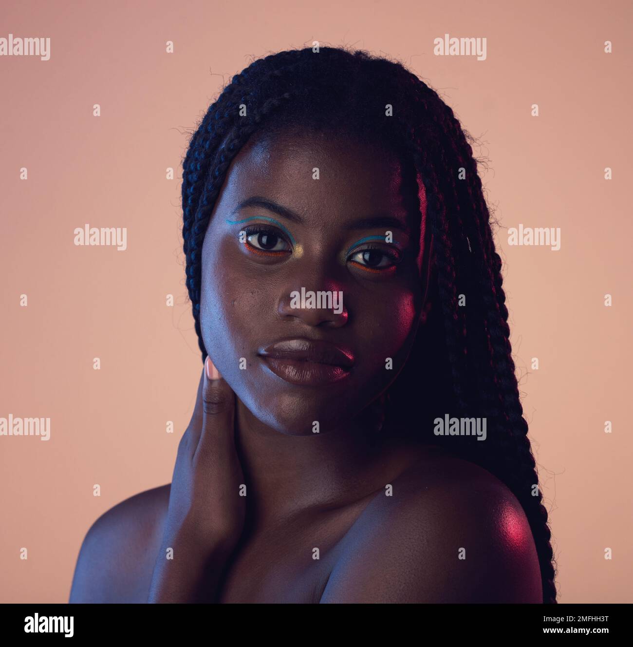 Portrait, hair and beauty with a model black woman in studio on a wall ...