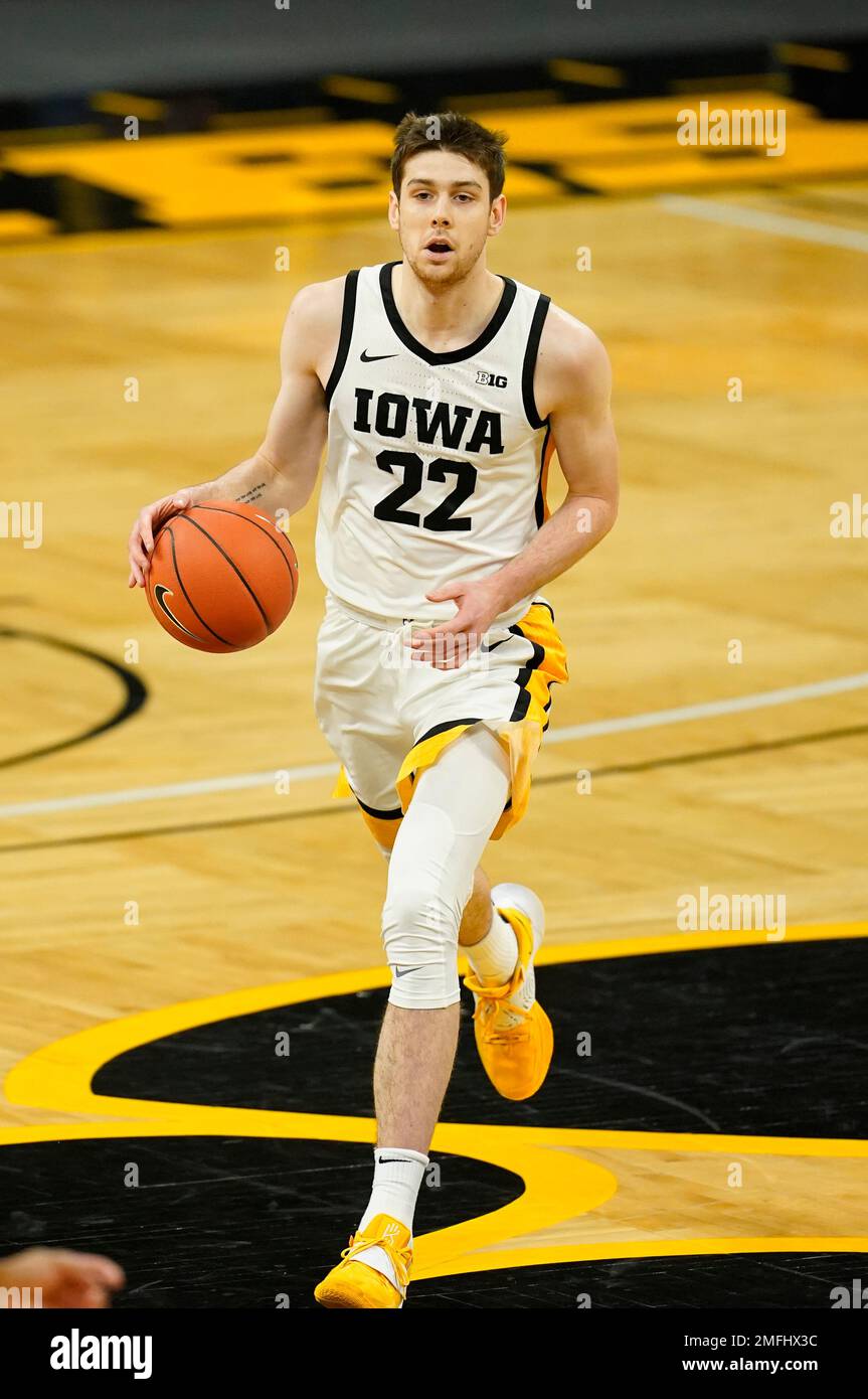 Iowa forward Patrick McCaffery drives up court during an NCAA college
