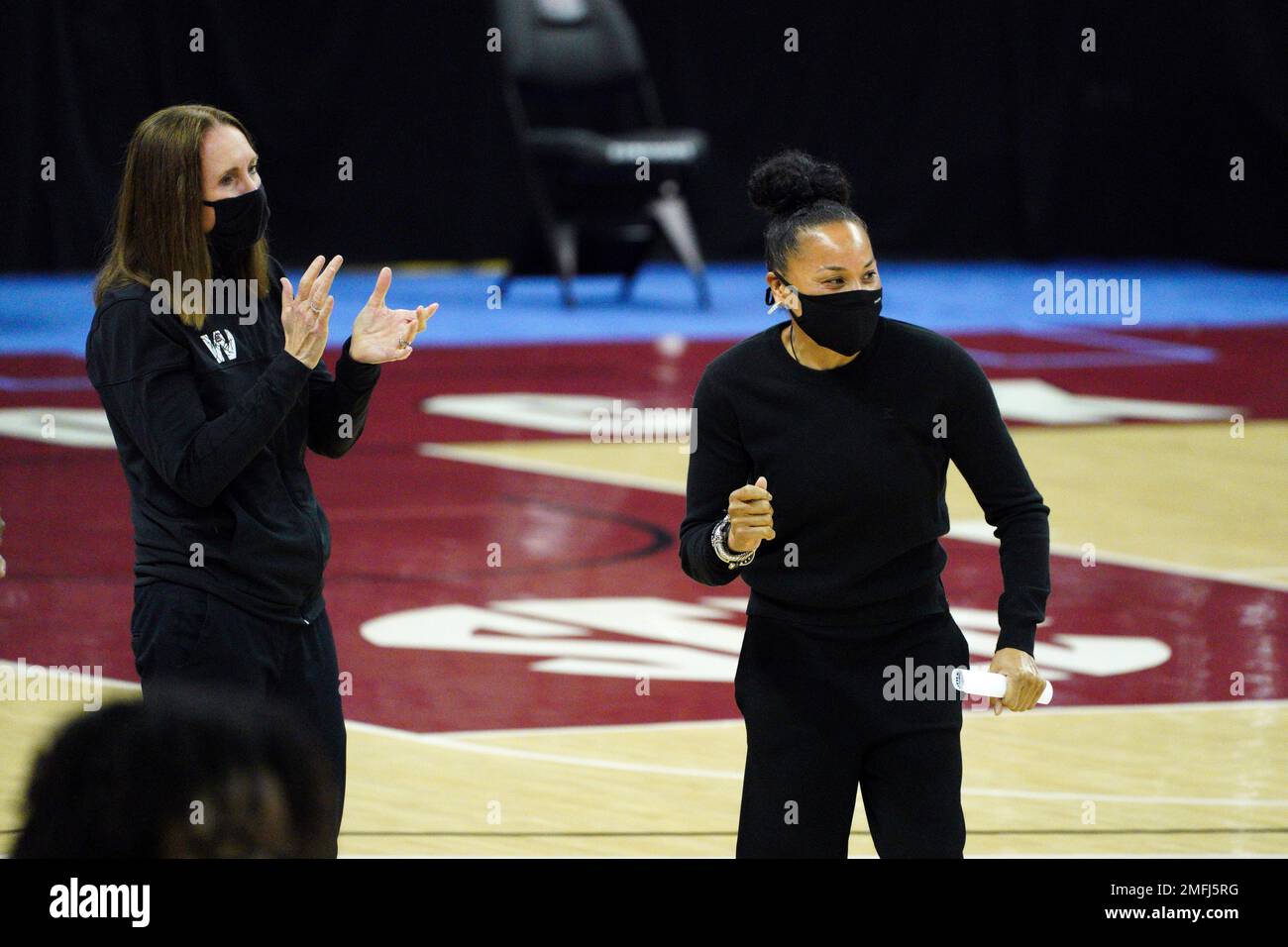 South Carolina head coach Dawn Staley, right, and assistant coach
