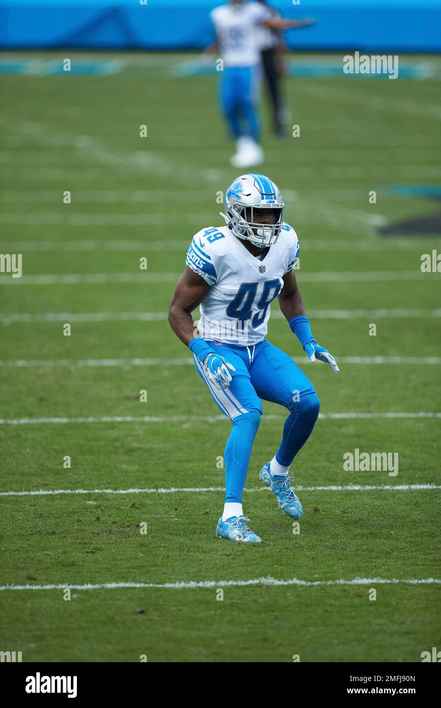 Detroit Lions safety C.J. Moore prays in the end zone before an