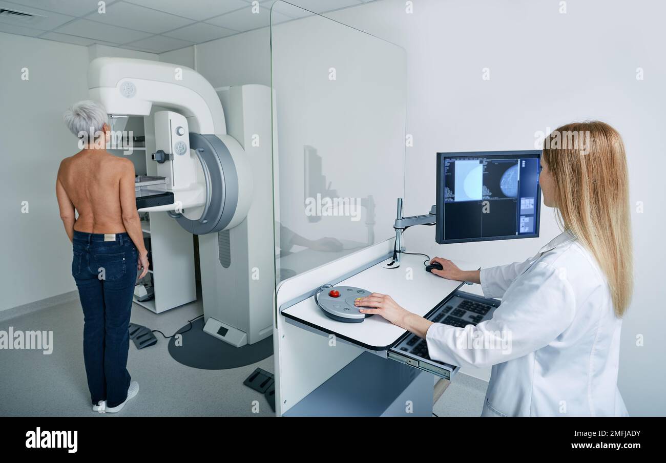 Mammogram procedure. Preventive diagnostic of senior woman by