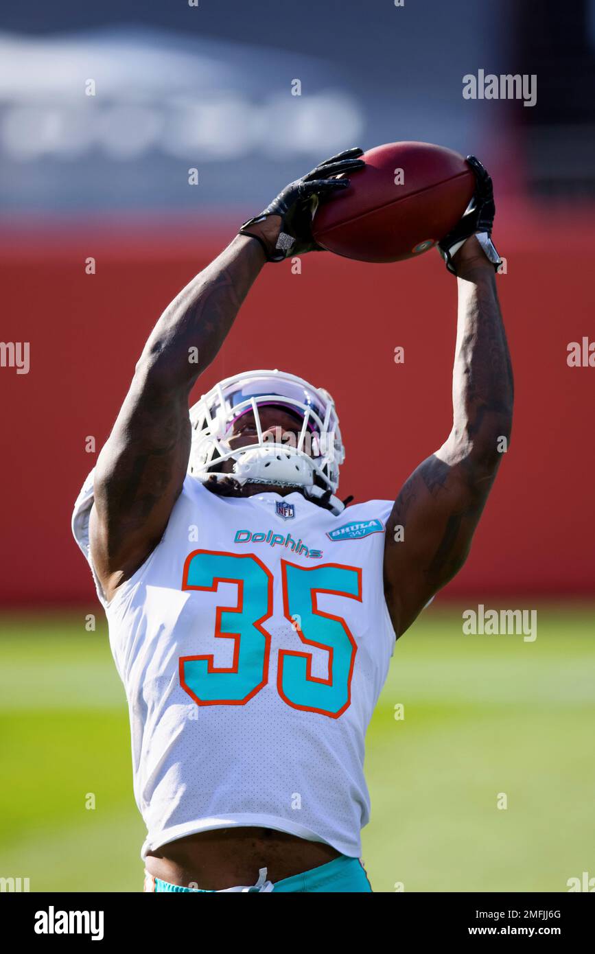 Miami Dolphins safety Kavon Frazier 35 warms up against the