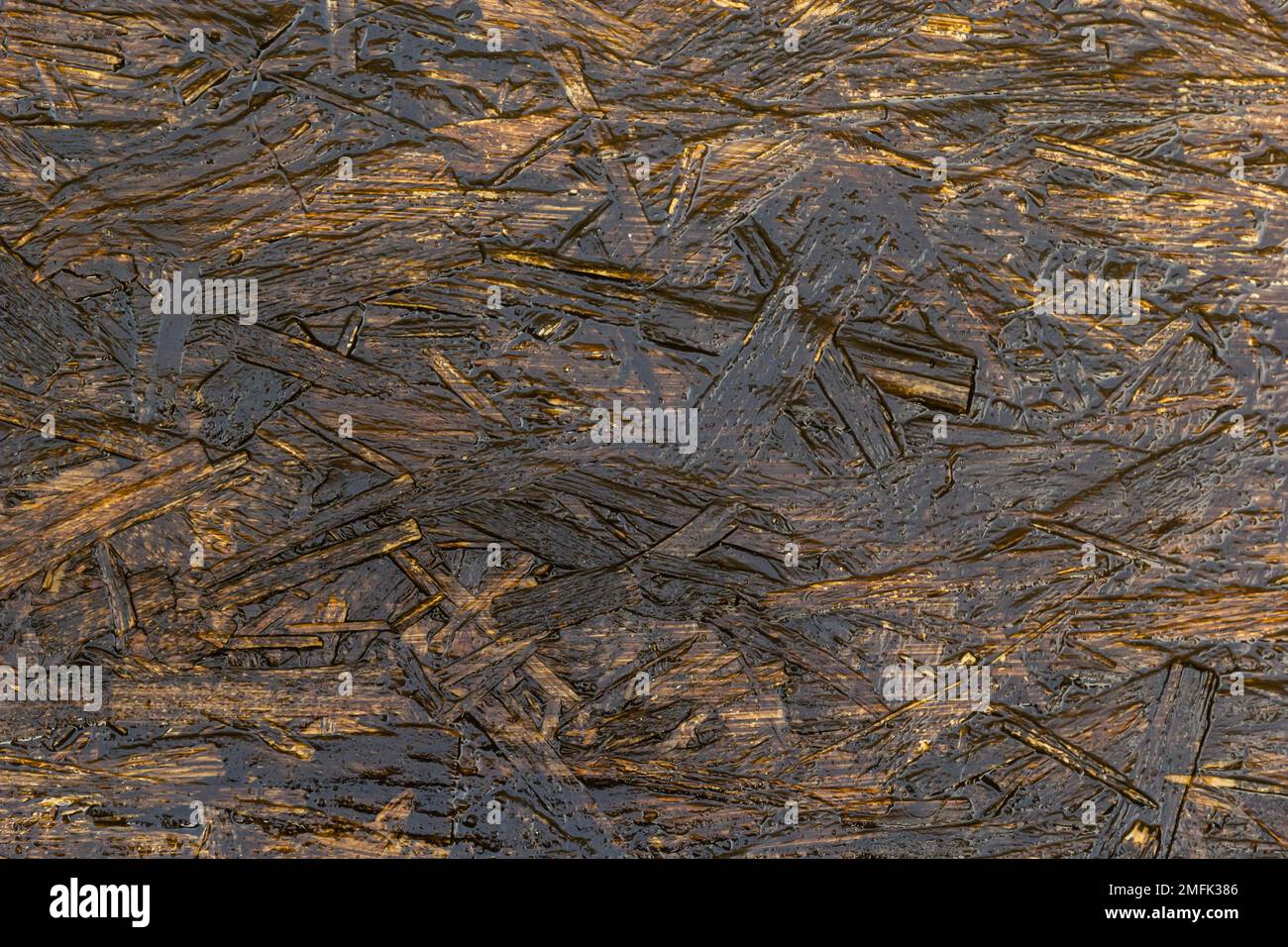 OSB board texture. Brown wooden background. Simple pressed