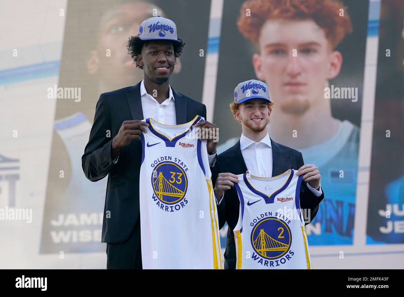 Golden State Warriors draft picks Jeremy Tyler, from left, Klay Thompson,  and Charles Jenkins hold up NBA jerseys as they are photographed at a news  conference in Oakland, Calif., Monday, June 27