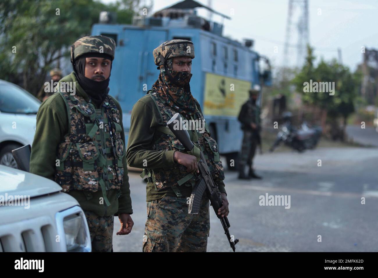 Indian Paramilitary Soldiers Stand Guard During A Gunfight Between ...