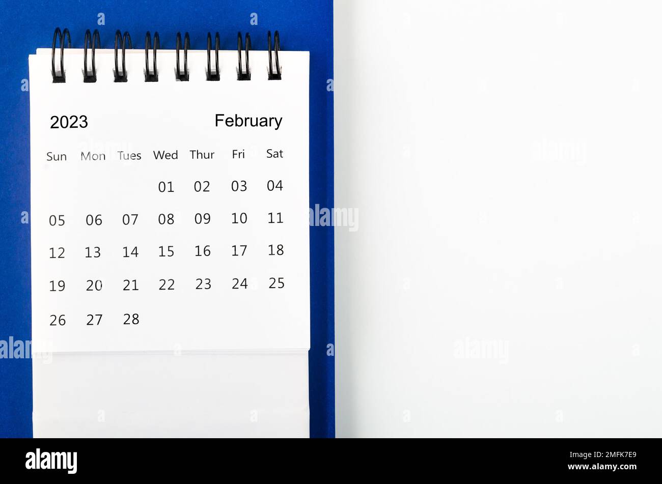 February 2023 Monthly desk calendar for 2023 year on blue and white ...