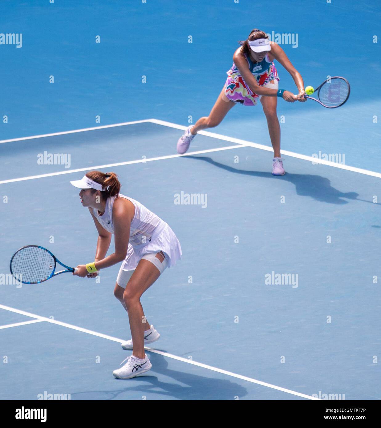 Melbourne, Australia. 25th Jan, 2023. Yang Zhaoxuan (L) of China/Chan Hao-Ching of Chinese Taipei compete during the women's doubles quarterfinal against Jessica Pegula/Coco Gauff of the United States at Australian Open at Melbourne Park in Melbourne, Australia, Jan. 25, 2023. Credit: Hu Jingchen/Xinhua/Alamy Live News Stock Photo
