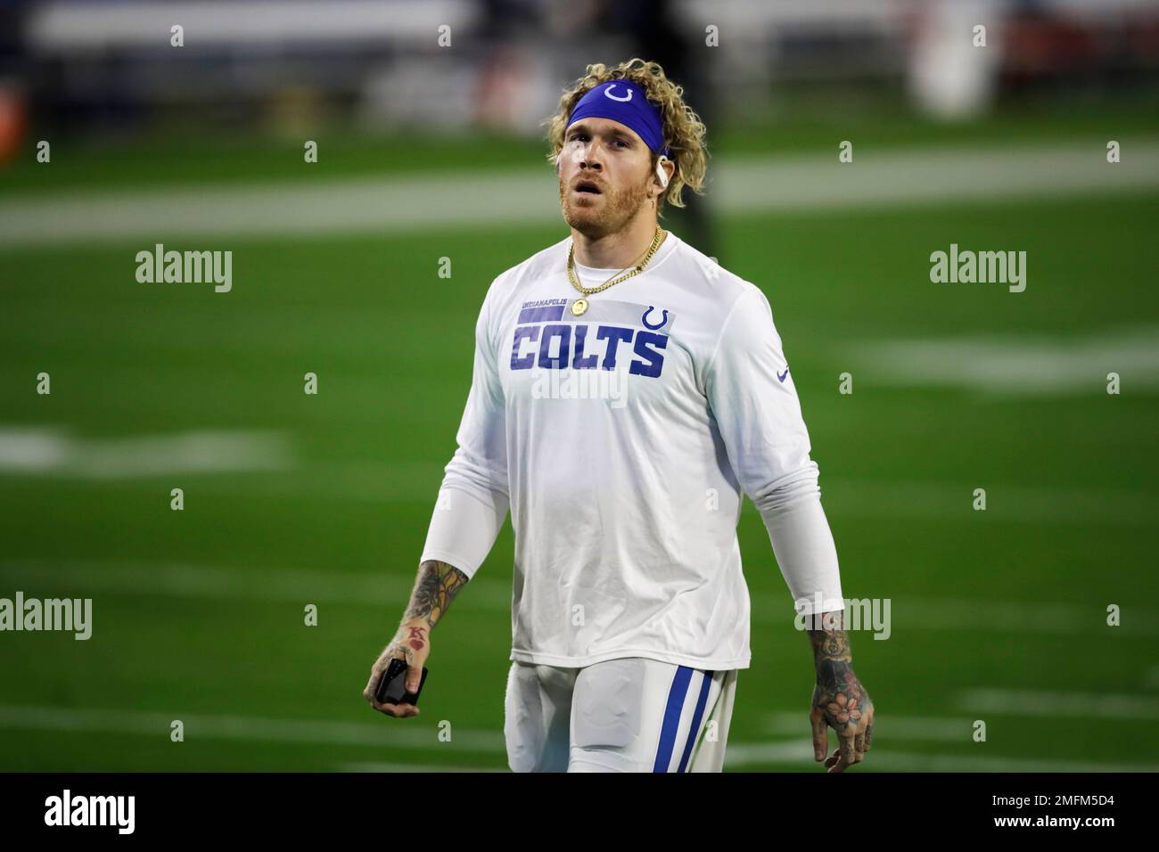 Indianapolis Colts wide receiver DeMichael Harris warms up before