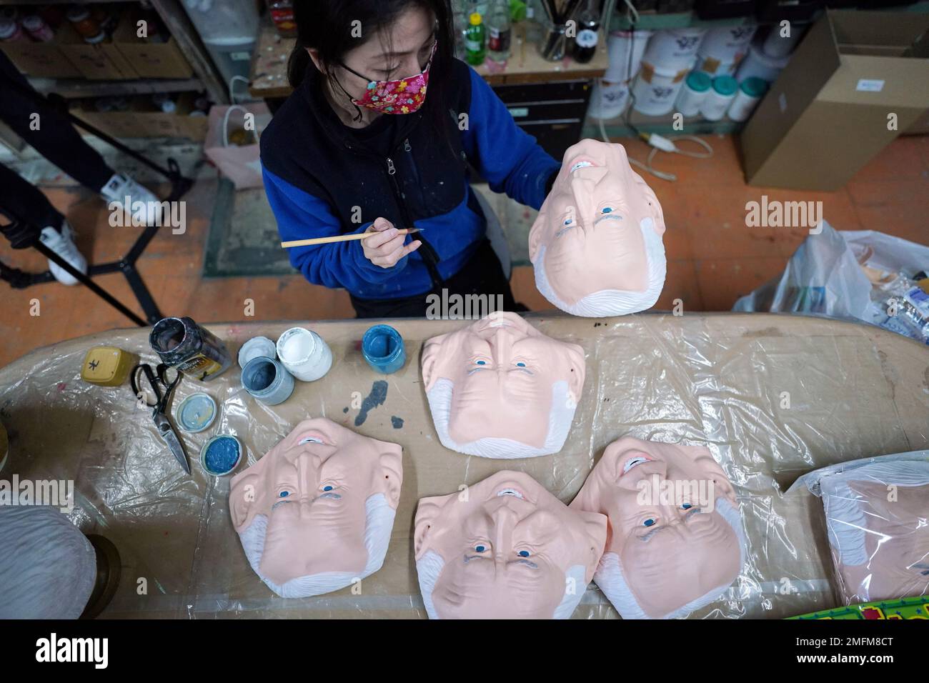 Workers of Ogawa Studios Co. are making rubber face masks of