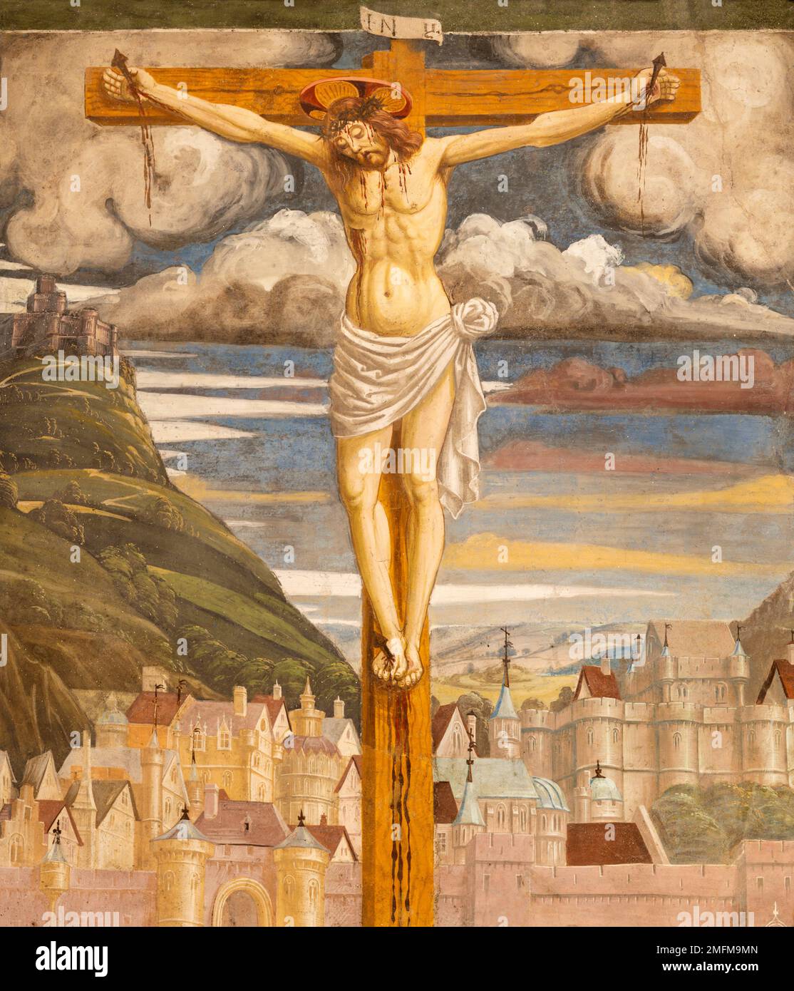BIELLA, ITALY - JULY 15, 2022: The detail of Crucifixion fresco in the church Chiesa di San Sebastiano by master of Lombard school from 16. cent. Stock Photo