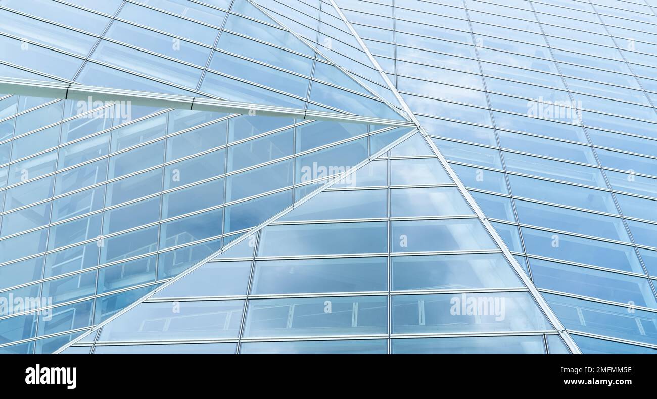 Modern glass office building. Exterior office glass building geometric architecture. Company