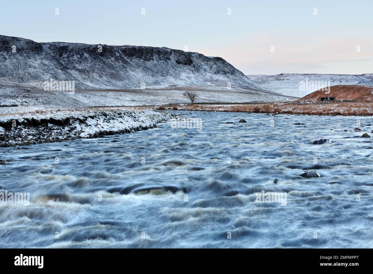 The River Tees and Cronkley Fell viewed from the Pennine Way at the Confluence of the River Tees and Harwood Beck in Winter, Forest-in-Teesdale, Count Stock Photo