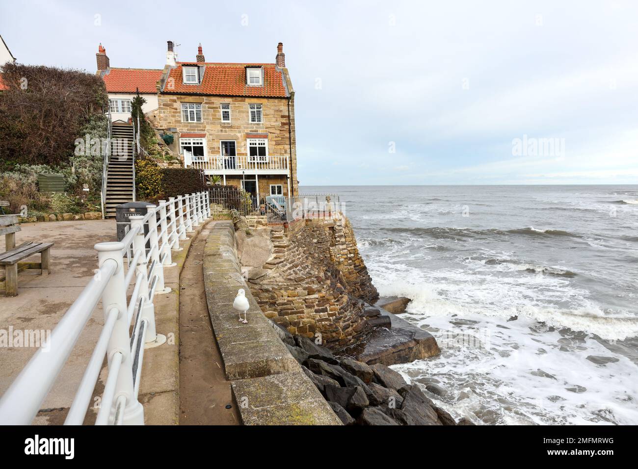 Seafront houses in Robin Hood’s Bay viewed from the Quarterdeck, North Yorkshire, UK Stock Photo