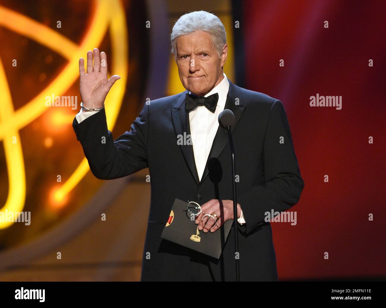 FILE This May 5, 2019, file photo shows Alex Trebek gestures while(02)