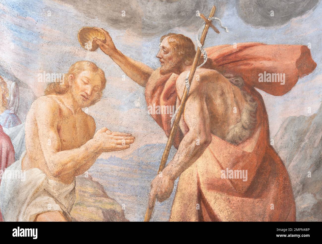 VARALLO, ITALY - JULY 17, 2022: The fresco of Baptism of Jesus in the church Collegiata di San Gaudenzio Stock Photo