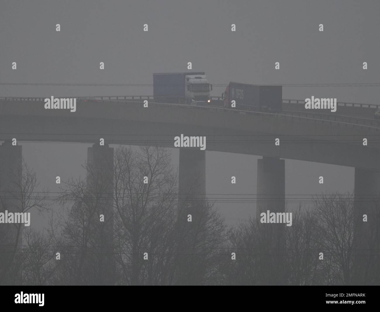 Elmley, Kent, UK. 25th Jan, 2023. UK Weather: a foggy day at the Sheppey Crossing in Kent. Credit: James Bell/Alamy Live News Stock Photo