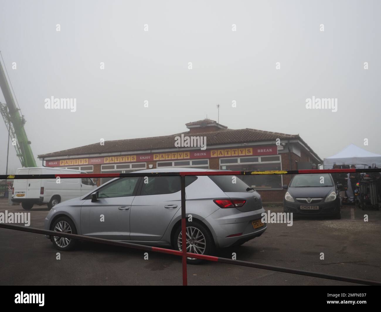 Detling, Kent, UK. 25th Jan, 2023. A film crew were spotted filming in the fog at a cafe off the A249 in Detling near Maidstone in Kent. Credit: James Bell/Alamy Live News Stock Photo