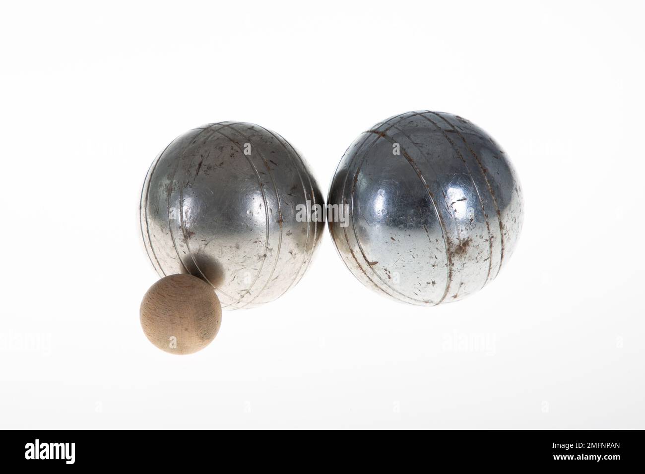 Petanque two steel balls with small wooden jack isolated on white background Stock Photo Alamy