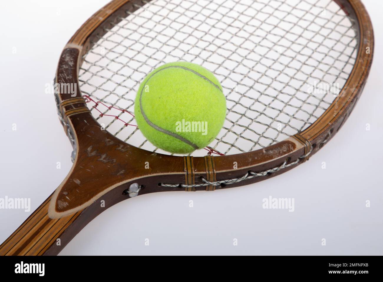 Old Racket Ball Old fashioned wooden tennis racket hi-res stock photography and images ...