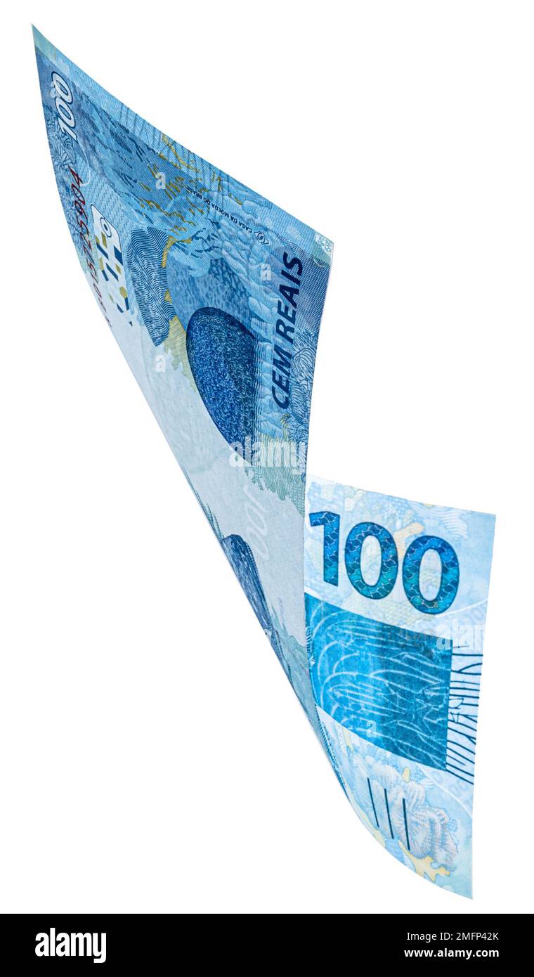 banknote of one hundred reais from brazil falling on isolated white ...