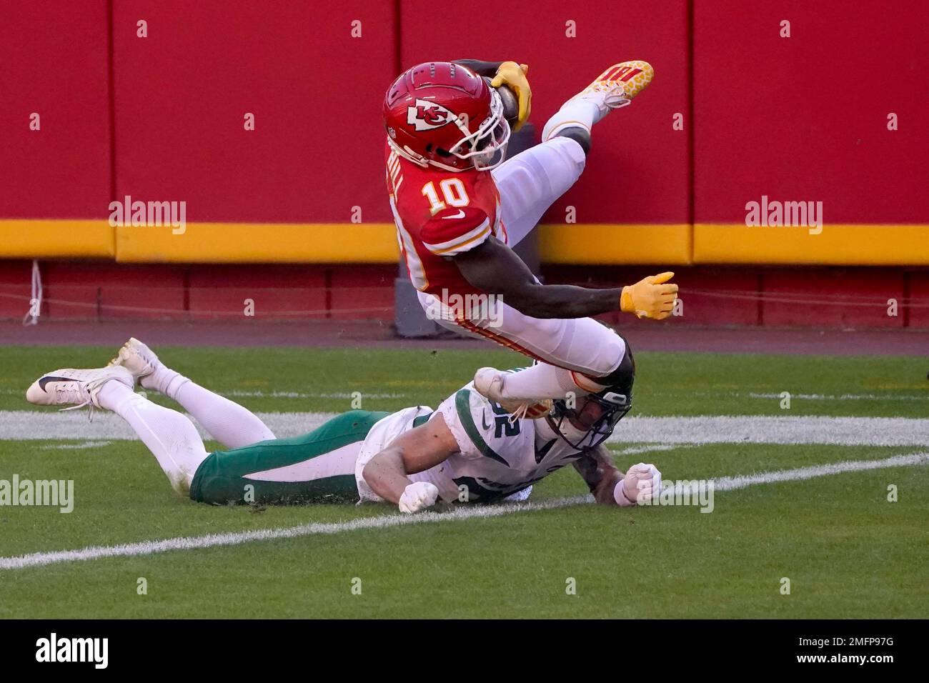 Kansas City Chiefs wide receiver Tyreek Hill (10) fights through the