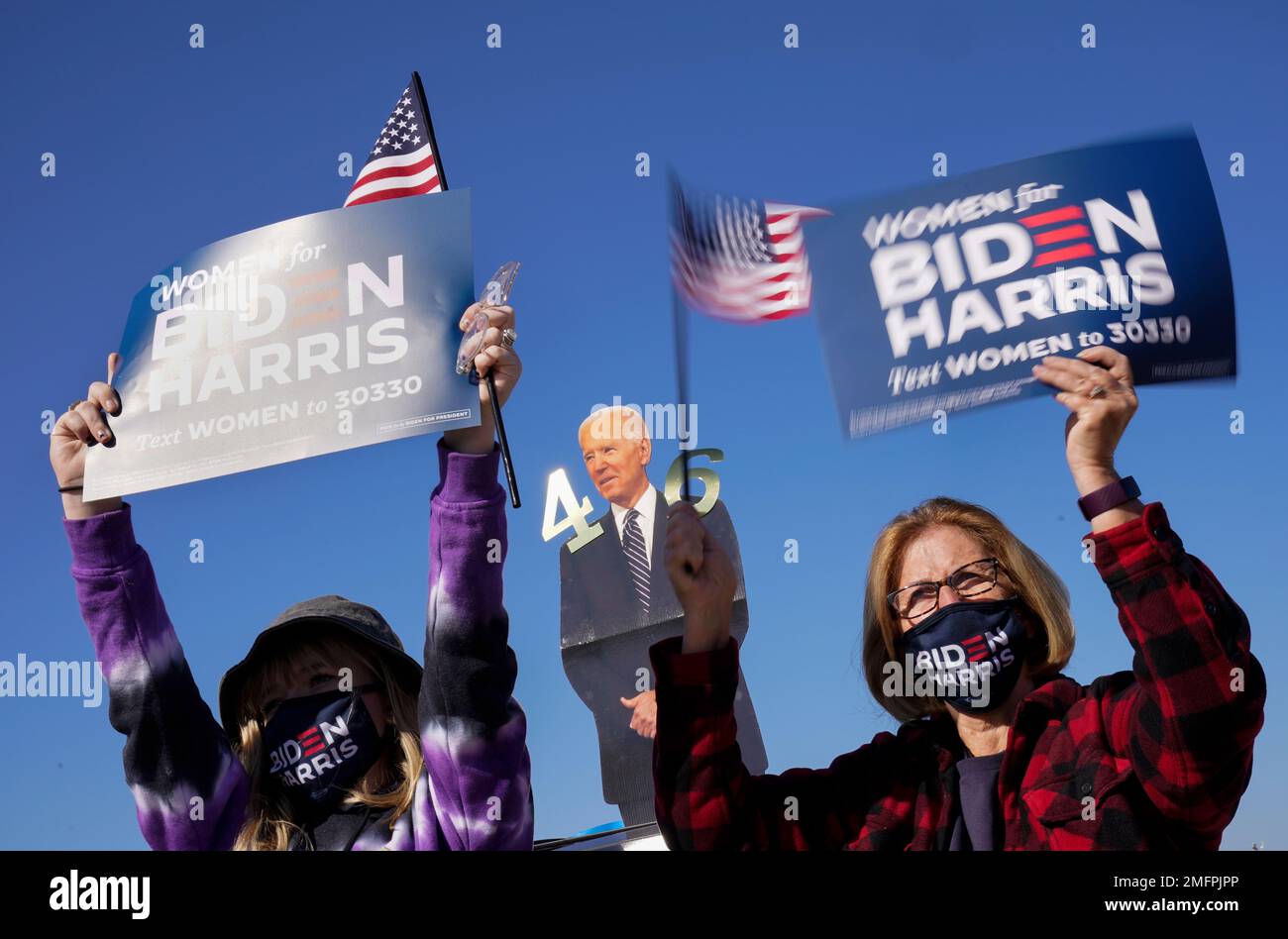 Supporters listen as Democratic presidential candidate former Vice ...
