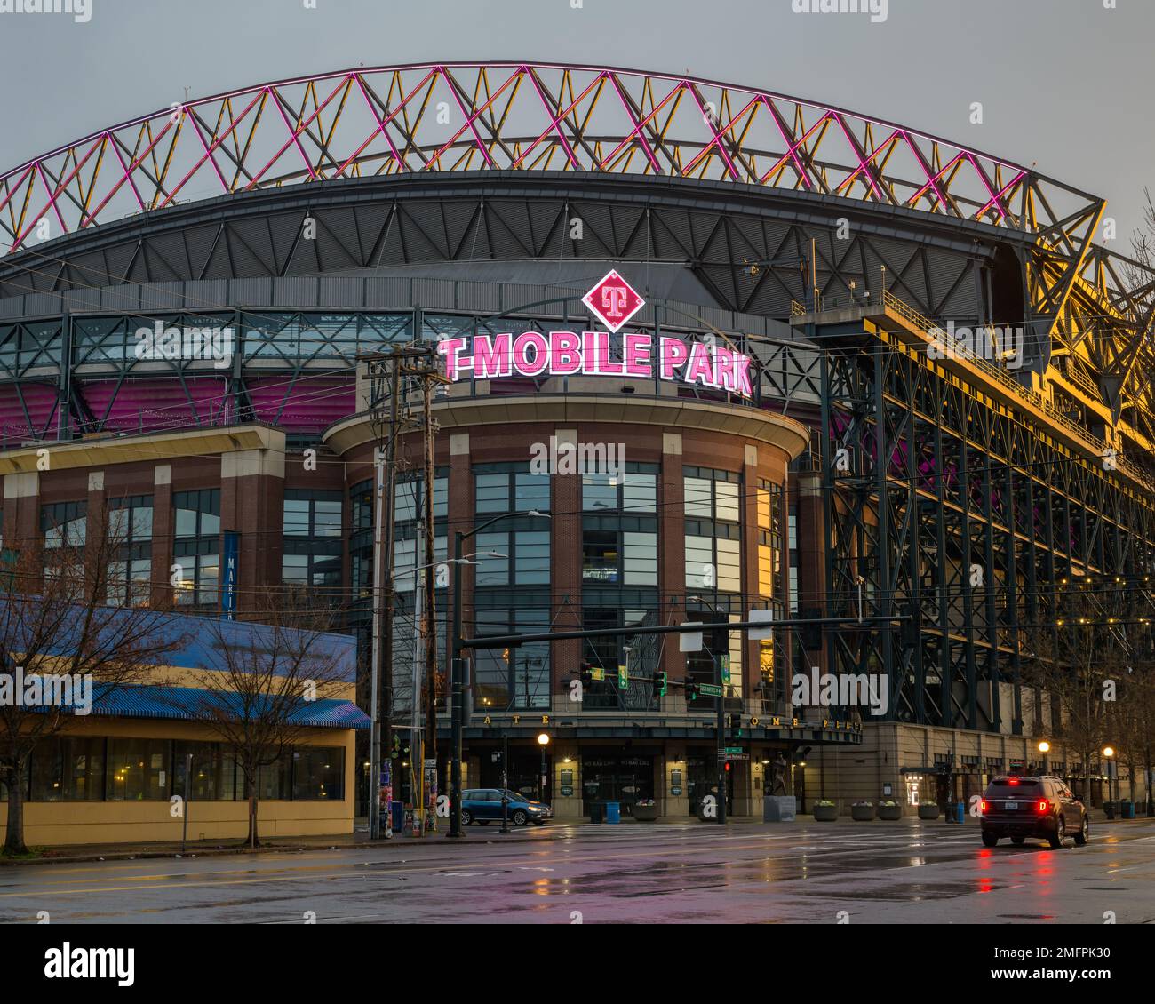 Seattle - January 15, 2023; T Mobile Park baseball stadium on a wet winter morning home of the Seattle Mariners with illuminated pink sign Stock Photo