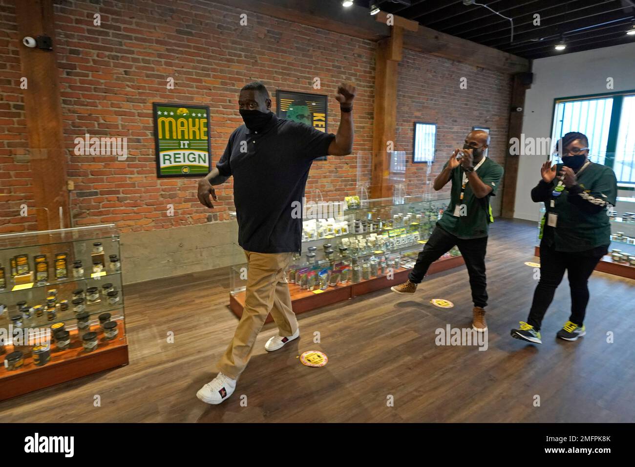 Shawn Kemp, left, a former NBA basketball player for the Seattle