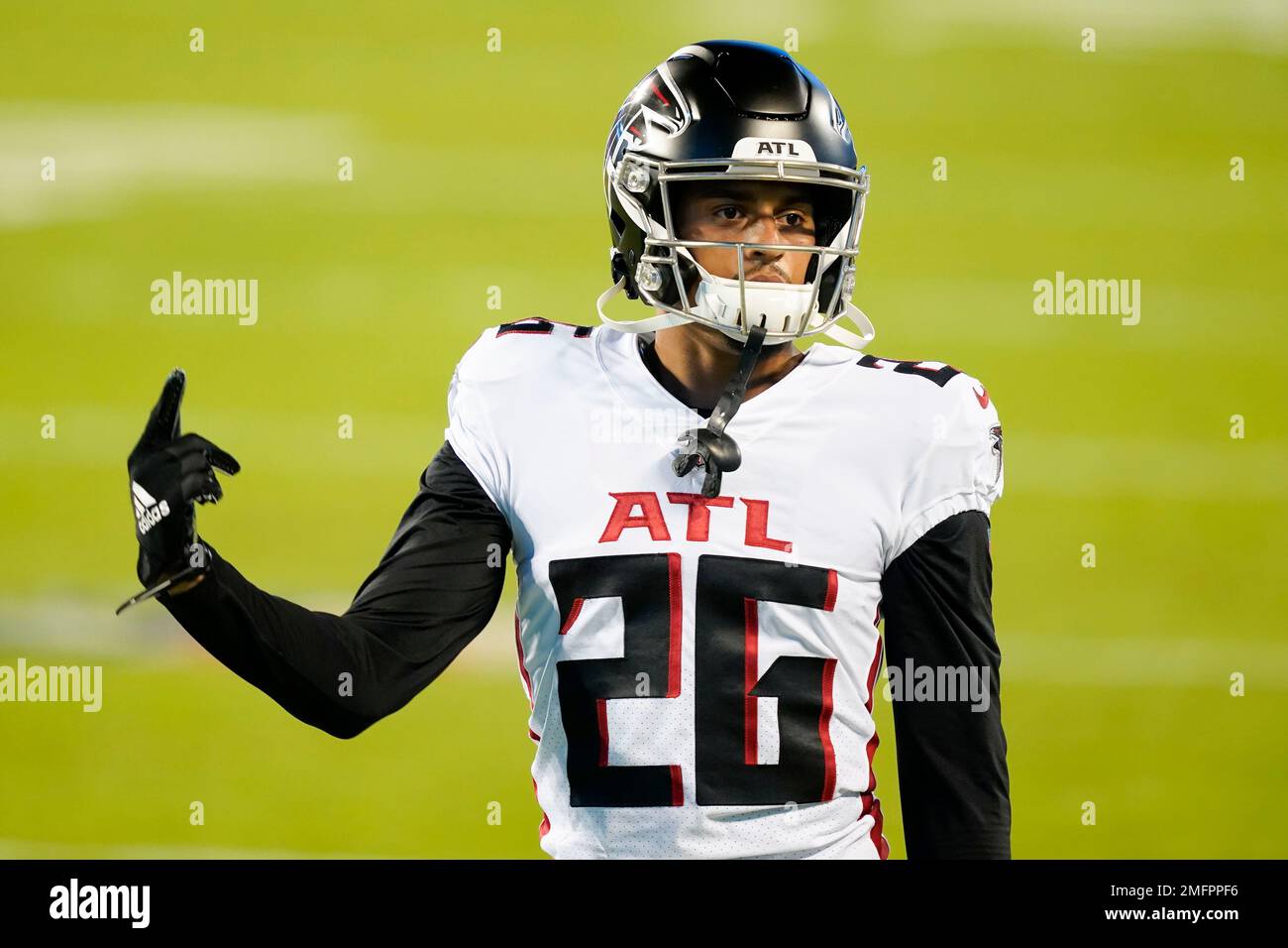 Atlanta Falcons cornerback Isaiah Oliver watches during warm ups before