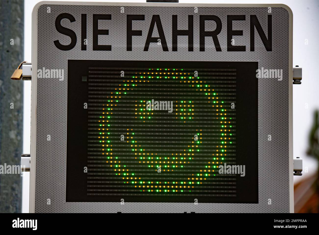Ladebow, Germany. 25th Jan, 2023. A digital display reading 'You drive' on a street in Ladebow (part of Greifswald) shows a green smiley face to a passing car in a 30-mph zone as a commendation for the driver's correct speed. Credit: Stefan Sauer/dpa/Alamy Live News Stock Photo