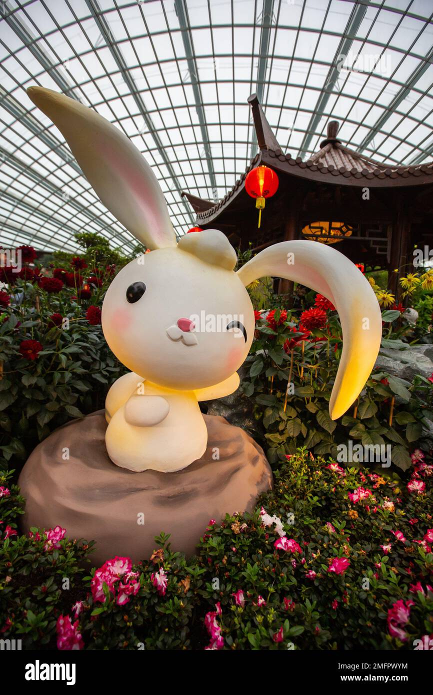 Vertical view of super cute rabbit statue decoration inside Flower Dome attraction point, Gardens by the Bay, Singapore. Stock Photo