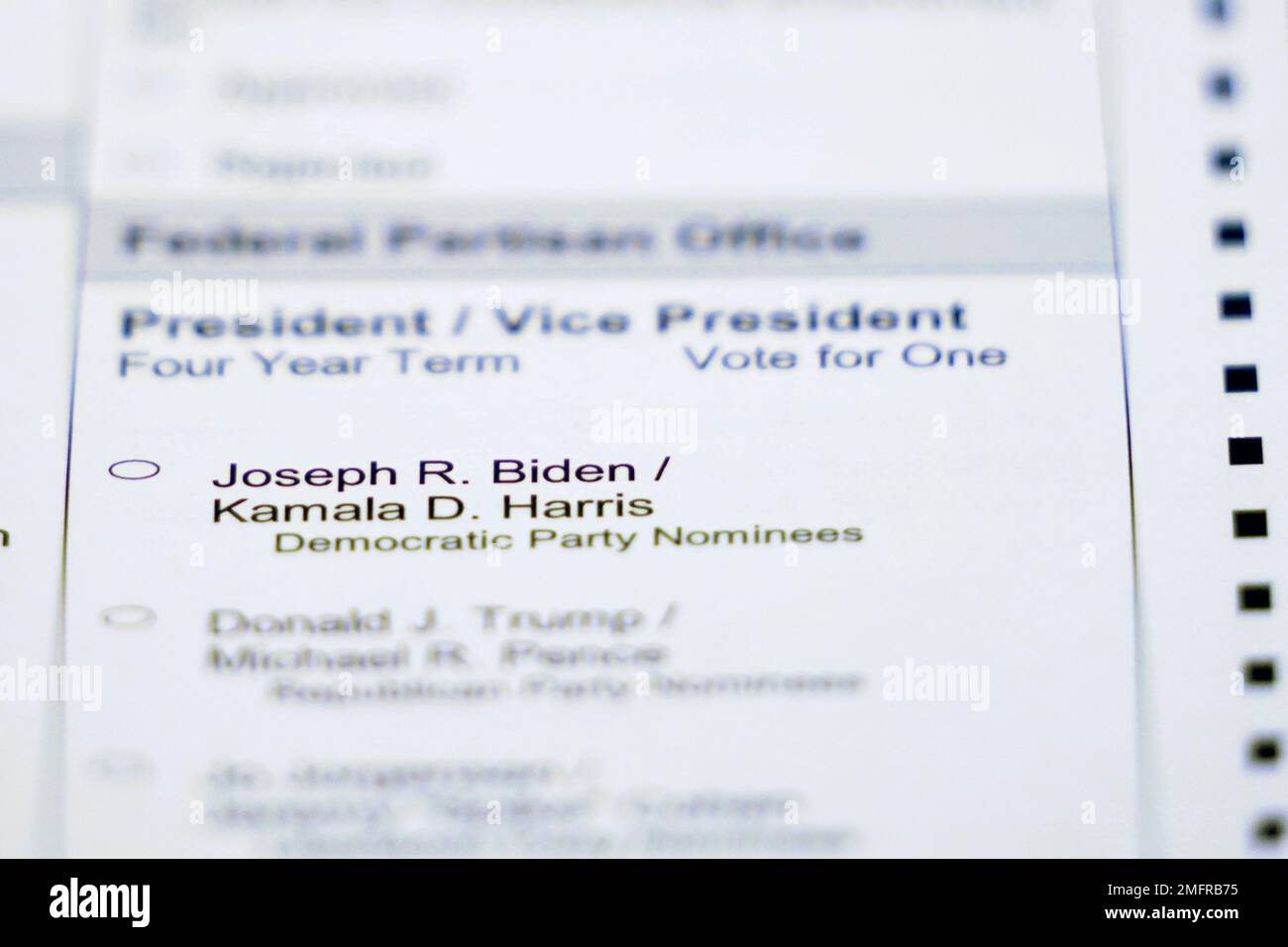 A portion of a Washington state mailin ballot is shown with choices that include Donald Trump