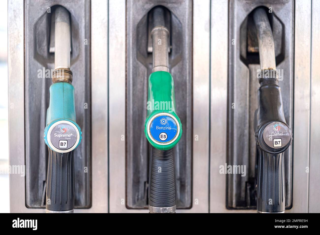 Service gas station with fuel, oil, gasoline and diesel. Close-up of a gas pump fueling gun. Petrol station. Stock Photo