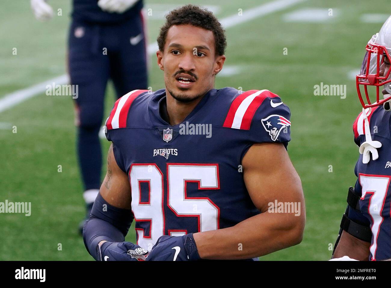 Derek Rivers New England Patriots defensive end Derek Rivers walks on the field ...