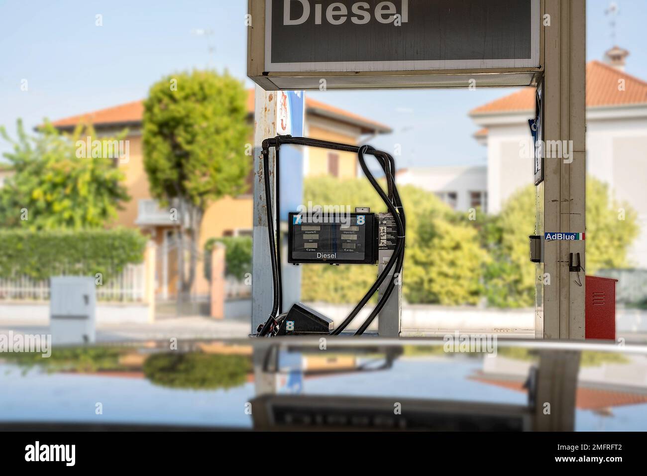 Service gas station with diesel. Close-up of a gas pump fueling gun. Petrol station. Stock Photo
