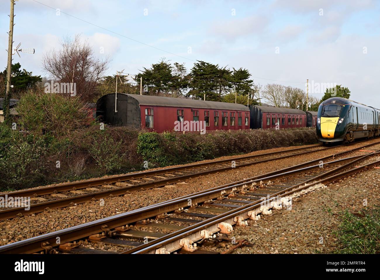 An Intercity Express Train passing camping coaches at Dawlish Warren, South Devon. Stock Photo