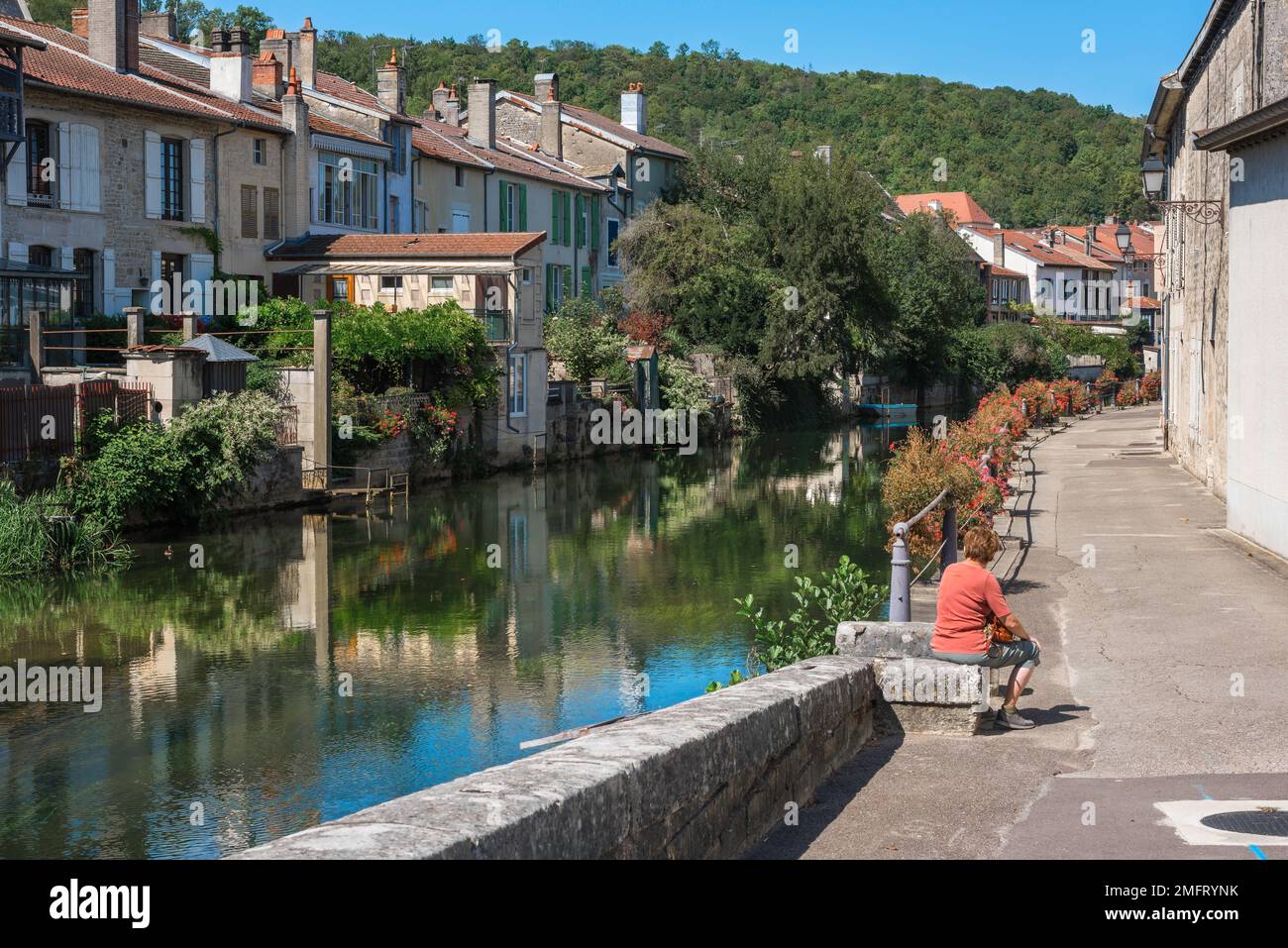 Joinville France, view in summer of the Quai des Peceaux, a waterfront path along the Marne River in the scenic town of Joinville, Haute-Marne, France Stock Photo