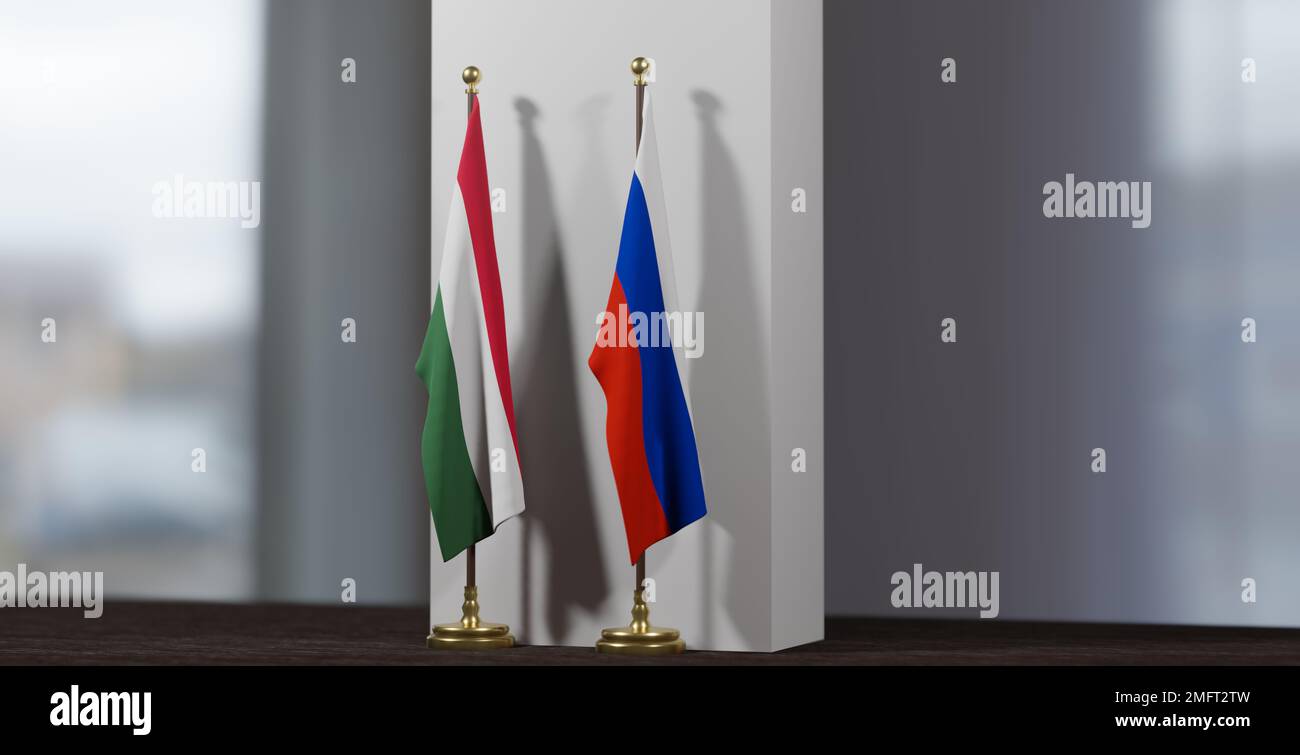 Hungary and Russia at the negotiating table, flag Hungary and flag Russia. Flags on little blur background. 3D work and 3D image Stock Photo