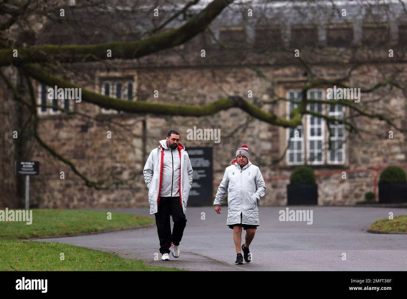 Cardiff, UK. 25th Jan, 2023. Warren Gatland, the head coach of Wales rugby team (r) arrives with Wales coach Jonathan Thomas (l) at the Wales rugby training session, Vale of Glamorgan on Wednesday 25th January 2023. The team are preparing for this years Guinness Six nations championship . pic by Andrew Orchard/Andrew Orchard sports photography/ Alamy Live News Credit: Andrew Orchard sports photography/Alamy Live News Stock Photo