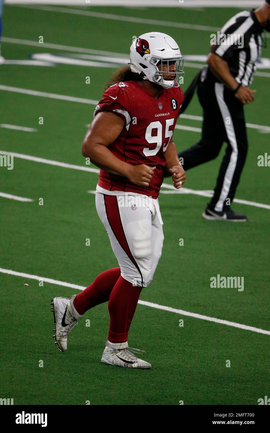 Arizona Cardinals defensive tackle Leki Fotu (95) runs off the field during  an NFL Football game in Arlington, Texas, Monday, Oct. 19, 2020. (AP  Photo/Michael Ainsworth Stock Photo - Alamy