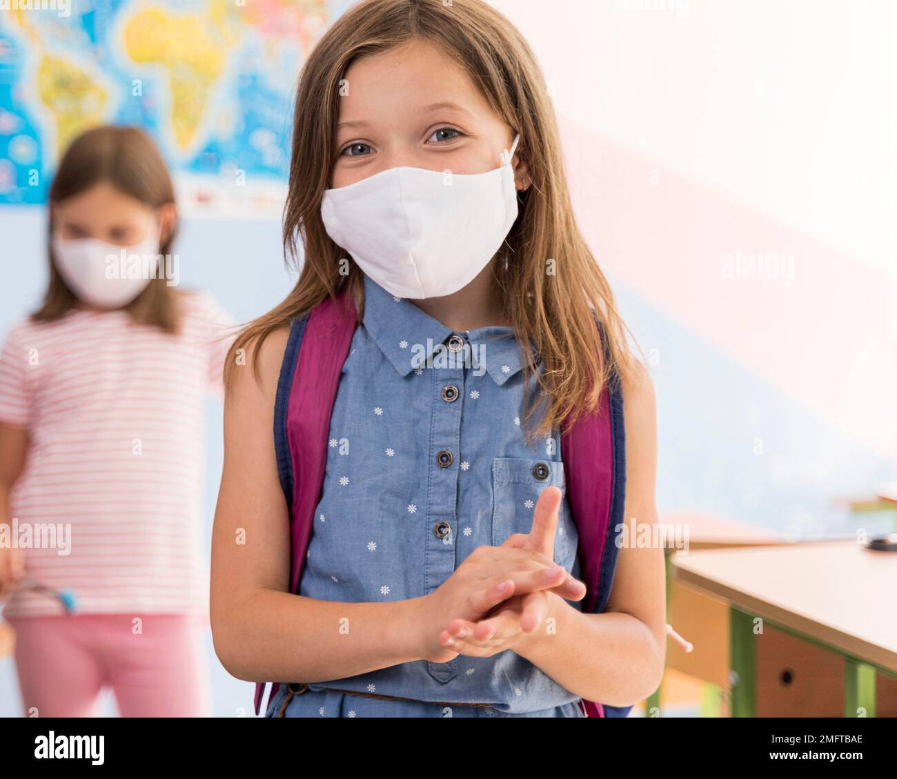 front view beautiful girls with face mask Stock Photo Alamy