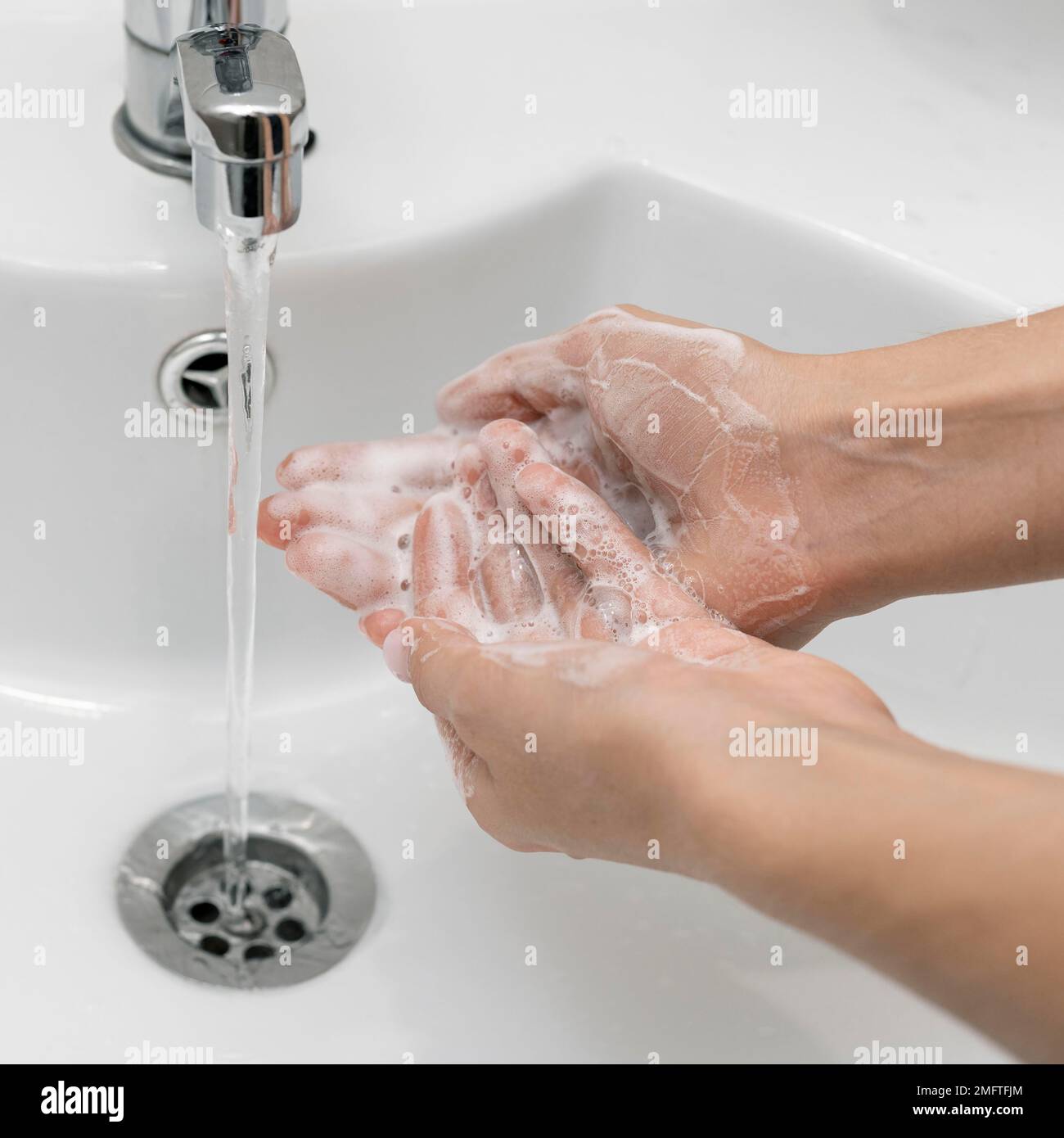 high angle person washing hands sink Stock Photo - Alamy